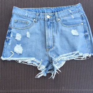 UNIF distressed shorts. Size 25.